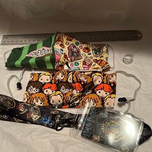 Two Harry Potter masks and a Harry Potter lanyard and ring.